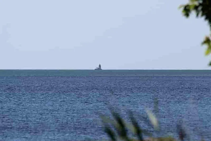 Detroit River lighthouse at the mouth of the river as it empties into Lake Erie