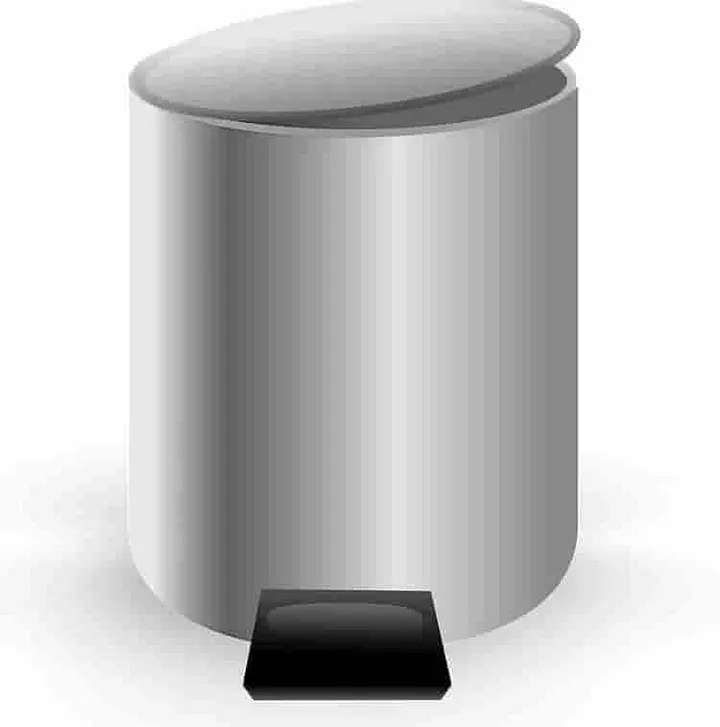 A small metal trash can with a foot pedal 